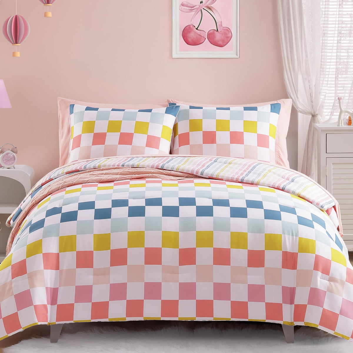 Wink Deer twin comforter set with colorful checkered pattern enhances a girl's playful bedroom.