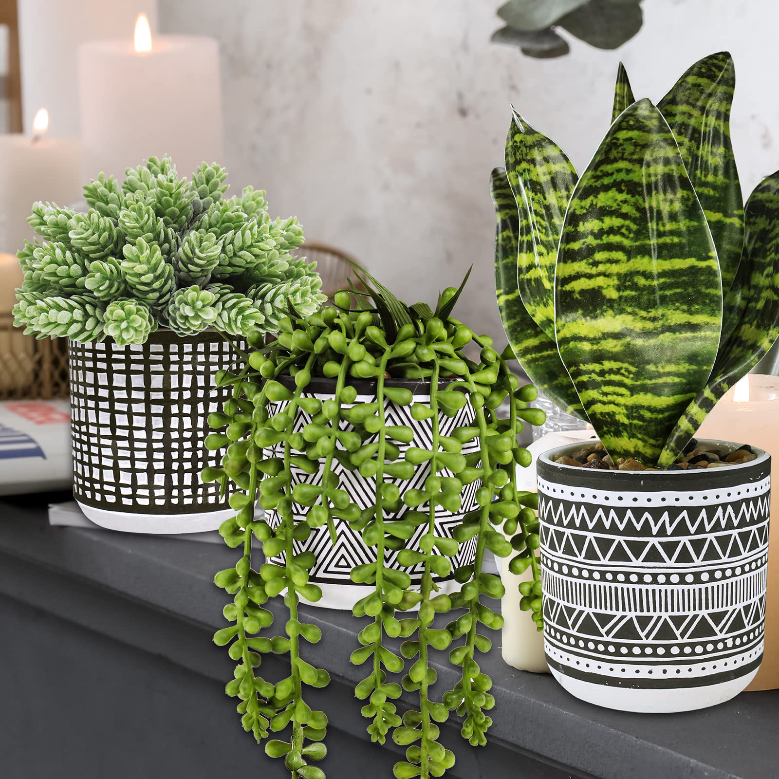 Winlyn sansevieria artificial snake plant in textured pot makes a bold desk accent.