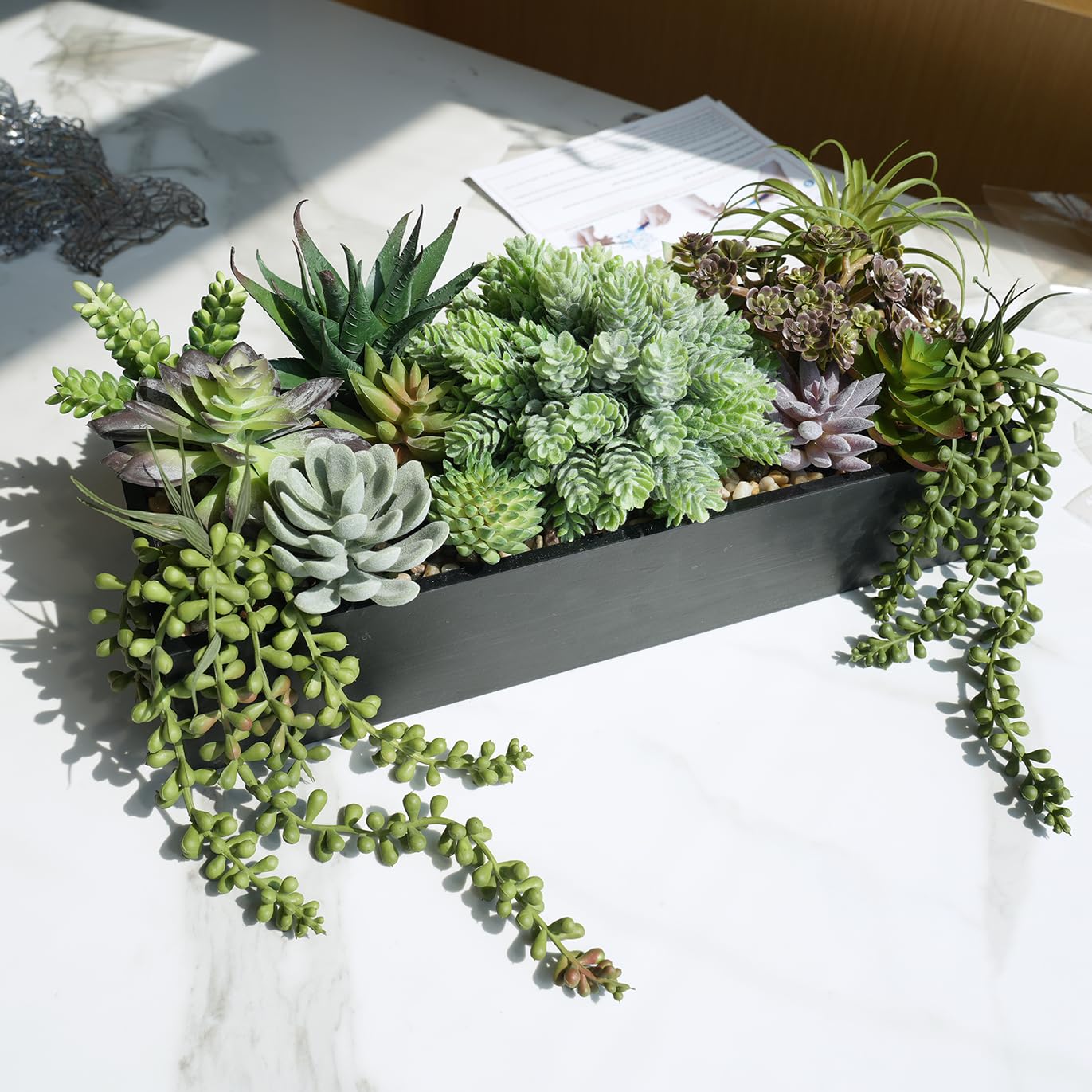 Winlyn durable faux garden decor blends with modern or rustic spaces.