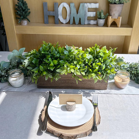 Winlyn boxwood sofa table display elevates living room decor