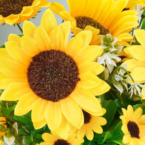 Winlyn galvanized pots with bright sunflowers adding rustic charm to a table