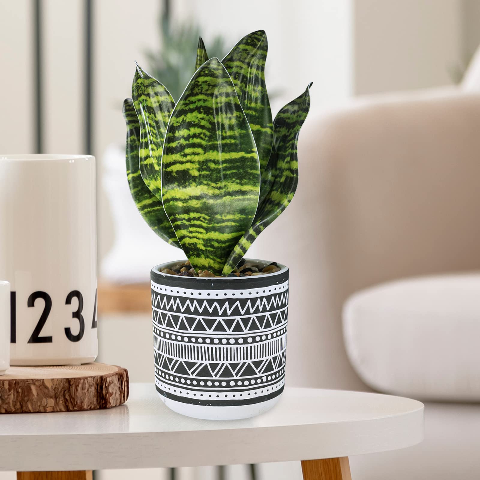 Winlyn geometric concrete pots with textured surfaces for contemporary decor.