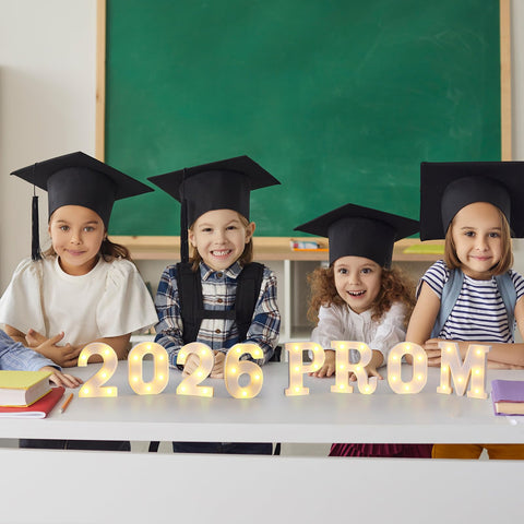 Woanger Class of 2026 signs offer a celebratory focal point.