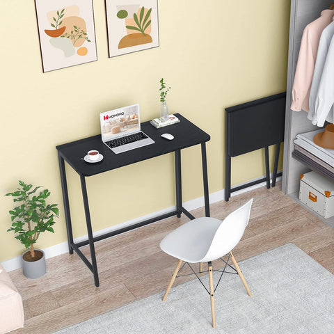 WOHOMO folding desk in folded state, slim profile for hidden storage.
