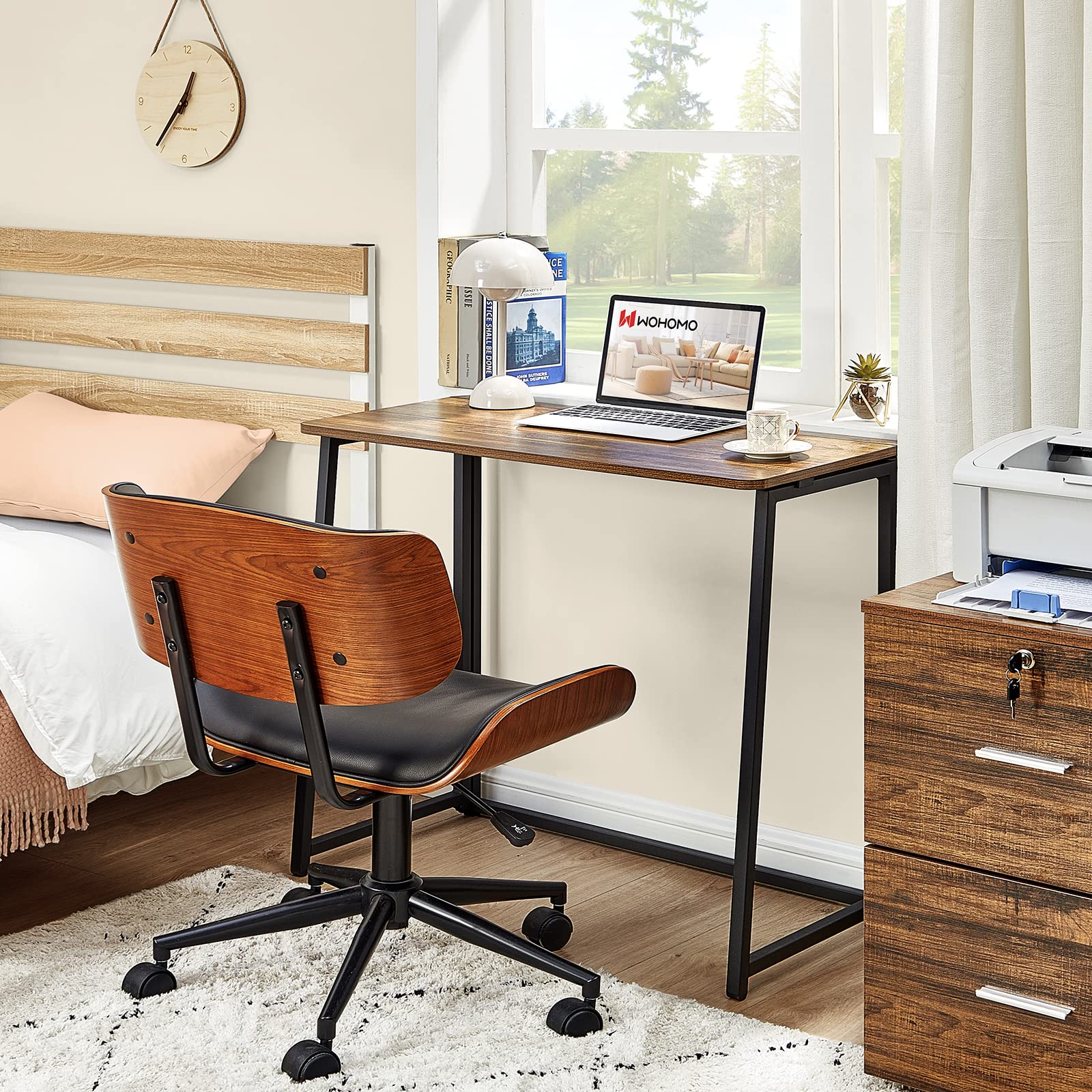 WOHOMO desk with a hidden fold hides neatly behind doors.