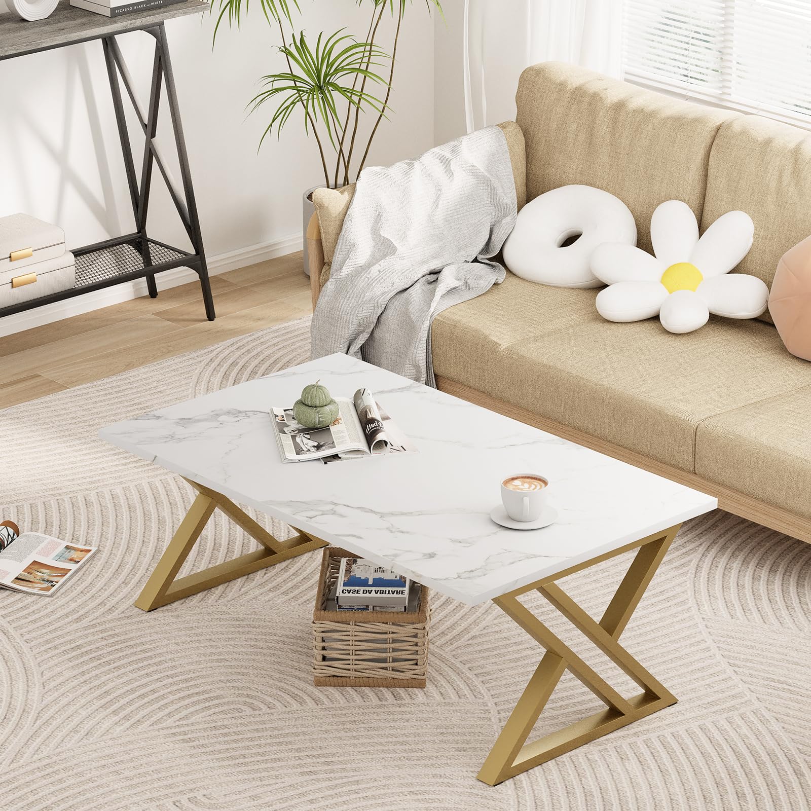 Wolawu coffee table features a gold metal frame for a touch of elegance.