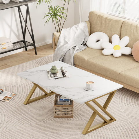 Wolawu coffee table features a gold metal frame for a touch of elegance.