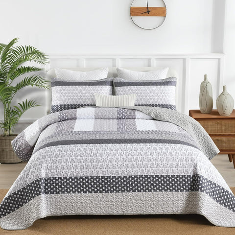 WONGS BEDDING grey boho quilt bed with two shams visible