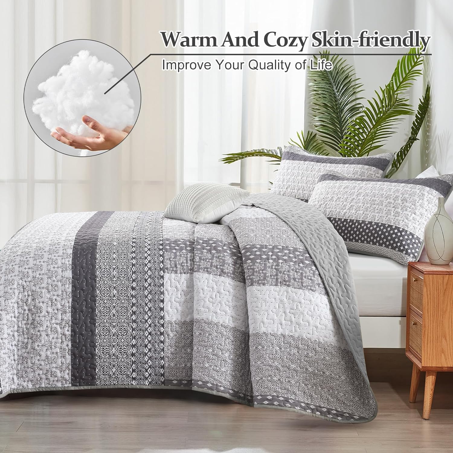 WONGS BEDDING grey quilt with two shams displayed on bed