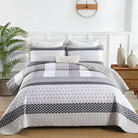 WONGS BEDDING quilt fabric texture close-up communicates breathable microfiber quality and soft touch.