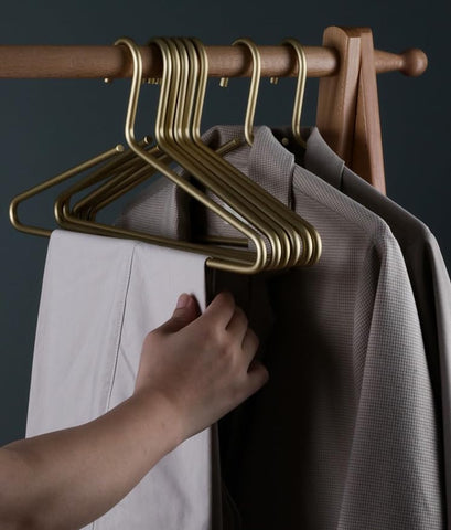 WONQEXZ dress shirt hanger keeps shirts wrinkle-free and neatly displayed.
