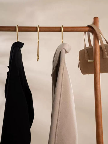 WONQEXZ durable metal construction ensures long-lasting support for heavy garments.