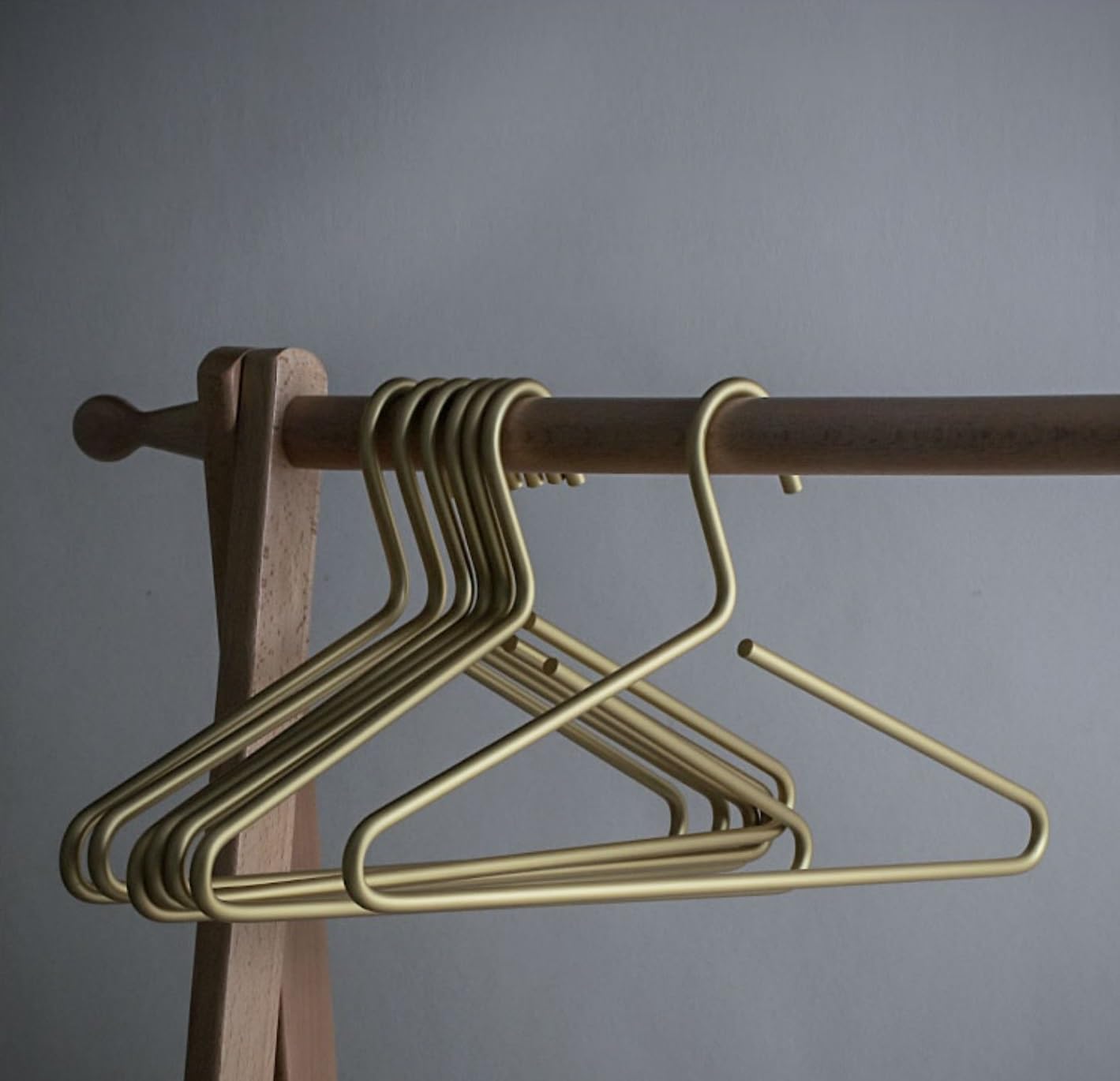 WONQEXZ premium matte gold hanger set packaging highlights luxury hardware for closets.