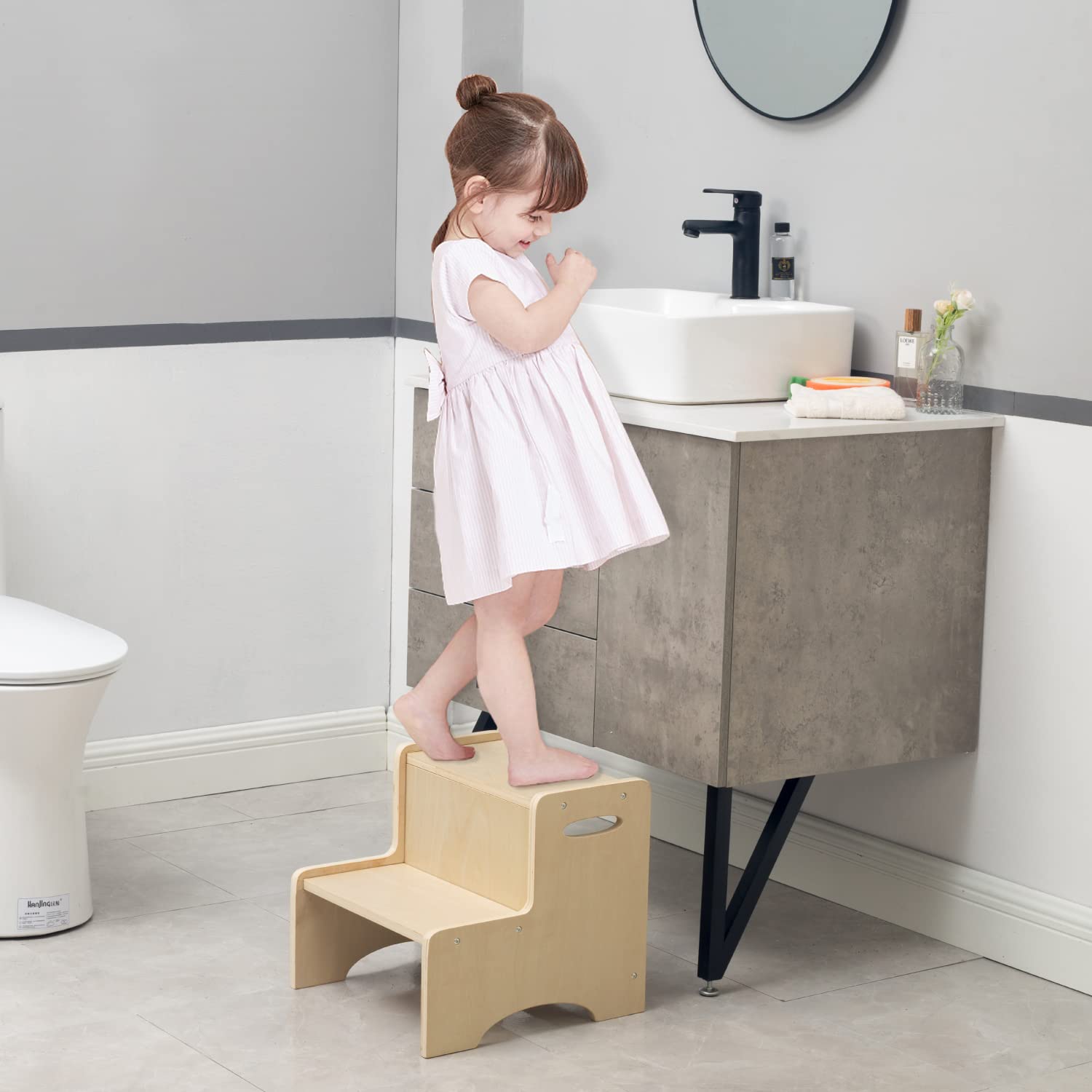 Wood City two step stool shown in bathroom for potty training