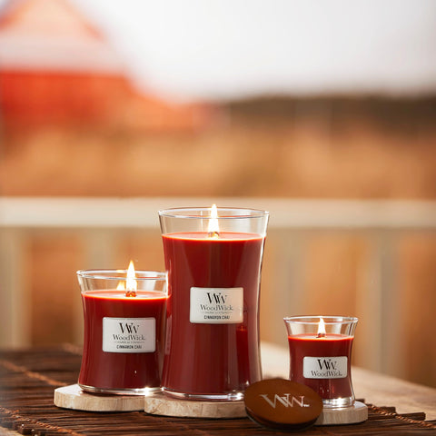 WoodWick Cinnamon Chai burning with crackling flame in a cozy setting