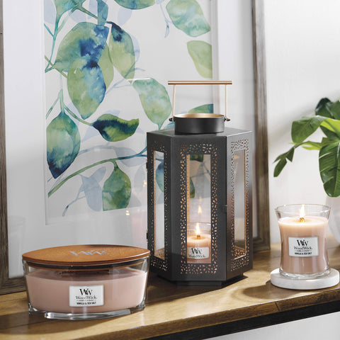 WoodWick Ellipse candle elevates any room with a sculptural design.