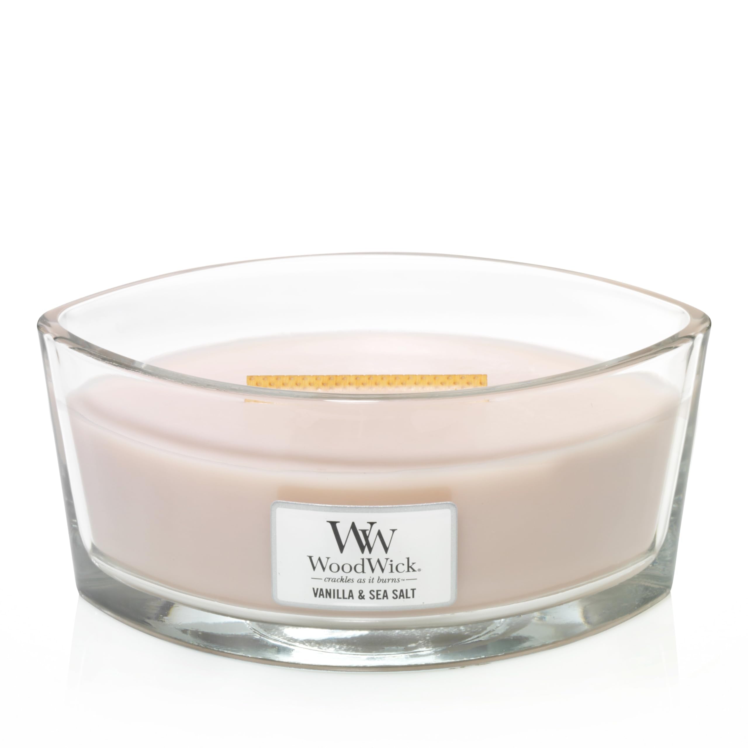 WoodWick Ellipse shows Hearthwick Flame crackling while releasing Vanilla and Sea Salt fragrance.