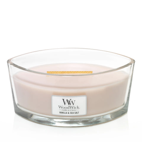 WoodWick Ellipse shows Hearthwick Flame crackling while releasing Vanilla and Sea Salt fragrance.