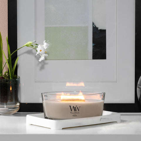 WoodWick ellipse candle is a decorative lighting accent.