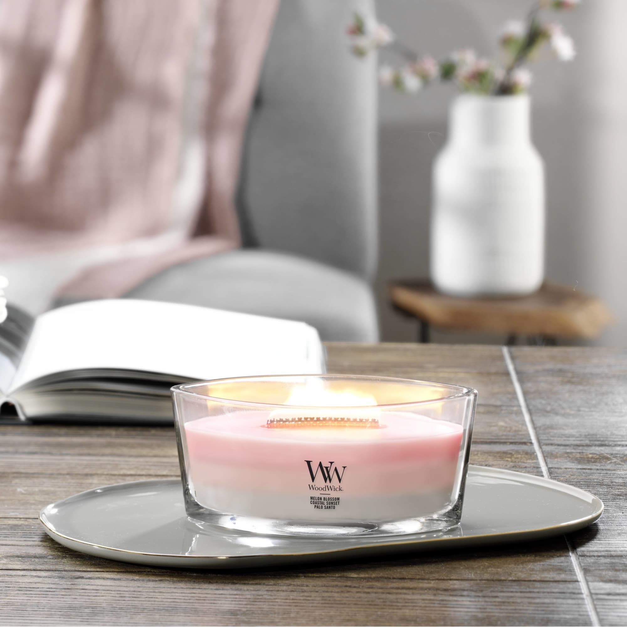 WoodWick ellipse-vessel design emphasizes the unique shape and long-lasting fragrance throw.