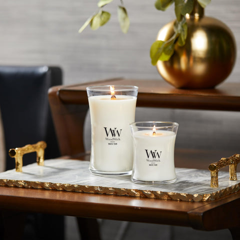 WoodWick iconic hourglass design serves as a decorative centerpiece.