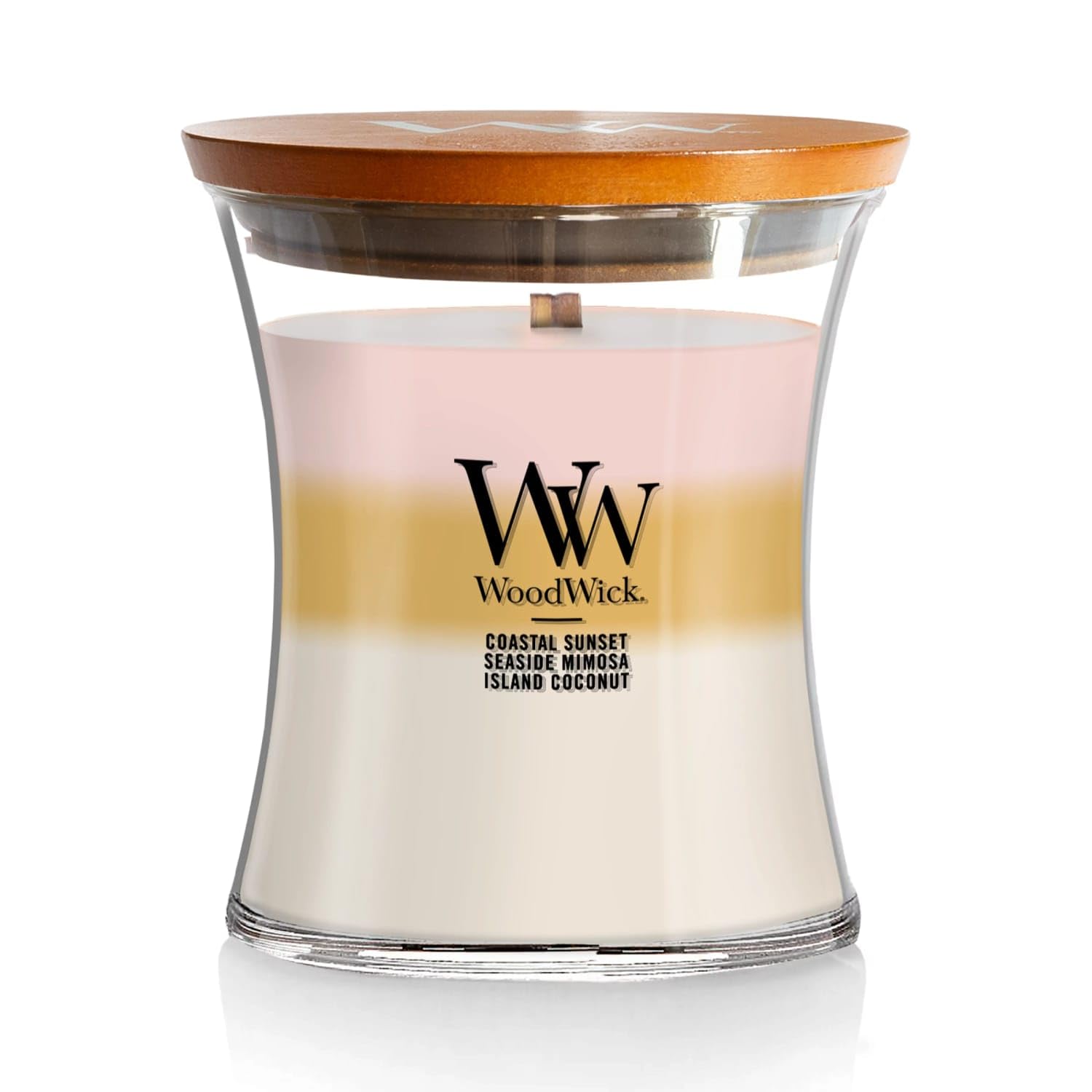 WoodWick Island Getaway Trilogy candle with layered fragrances unveiling evolving scent as it burns.