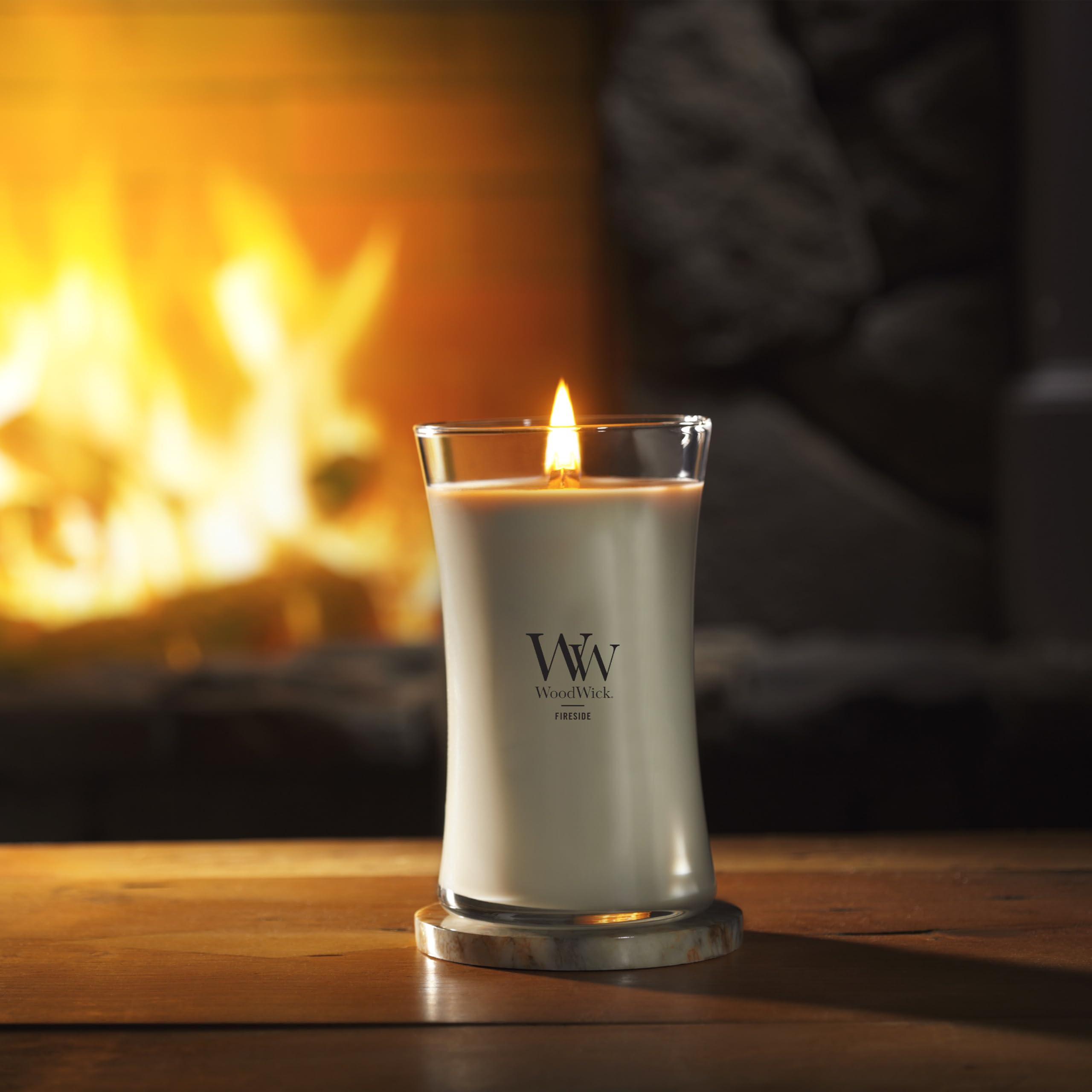WoodWick large hourglass fireside candle 21oz container provides long-lasting aroma.