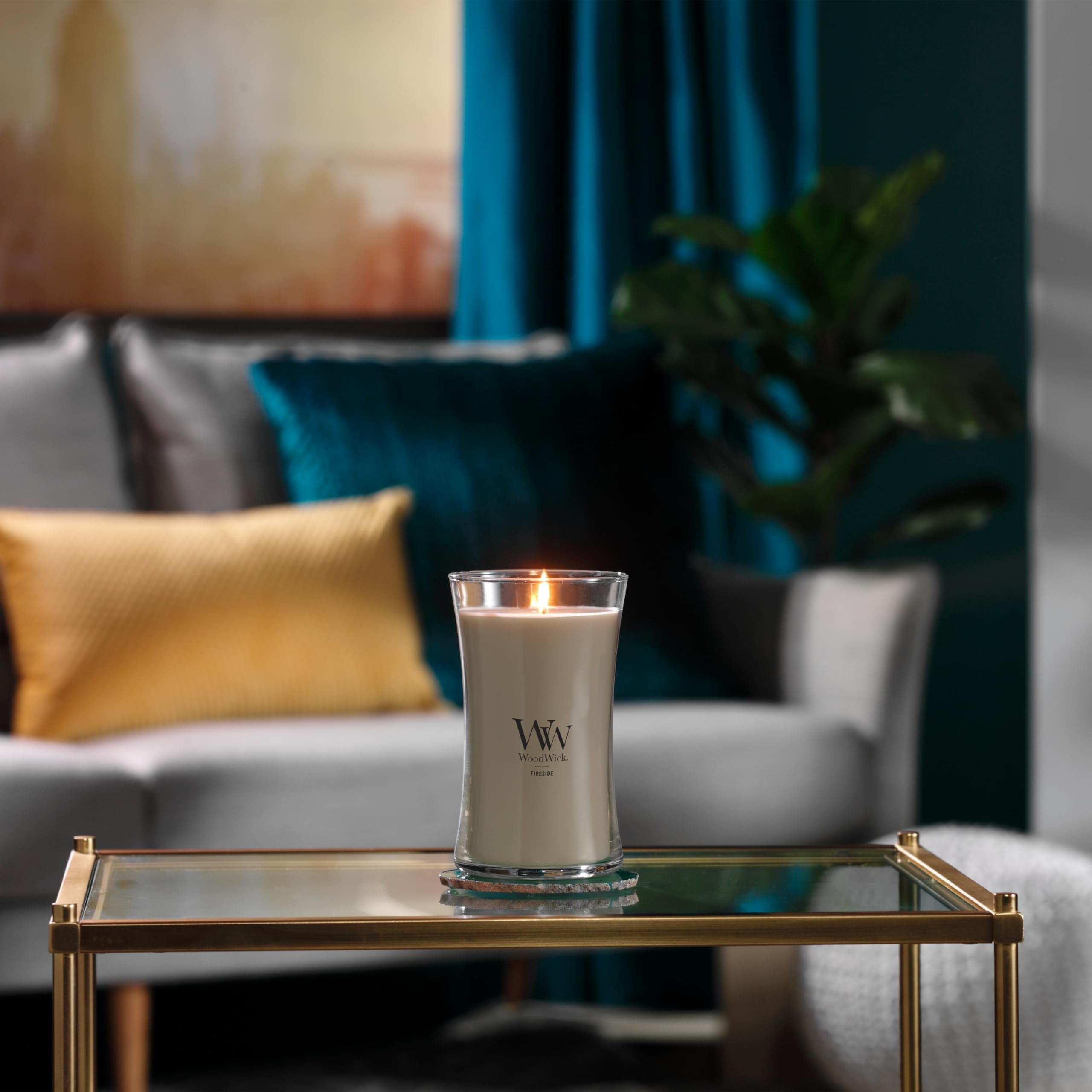 WoodWick large hourglass fireside candle hourglass design adds elegant decor touch.
