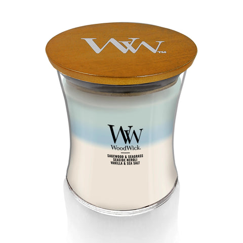 WoodWick Oceanic Trilogy layered fragrances reveal evolving scent as it burns, for a unique atmosphere.