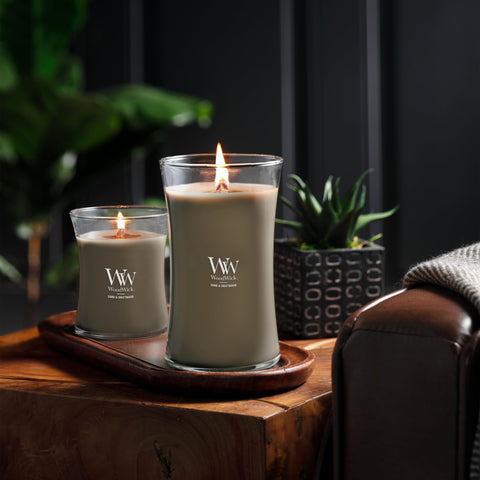 Cozy living room scene featuring a gift-worthy WoodWick candle.
