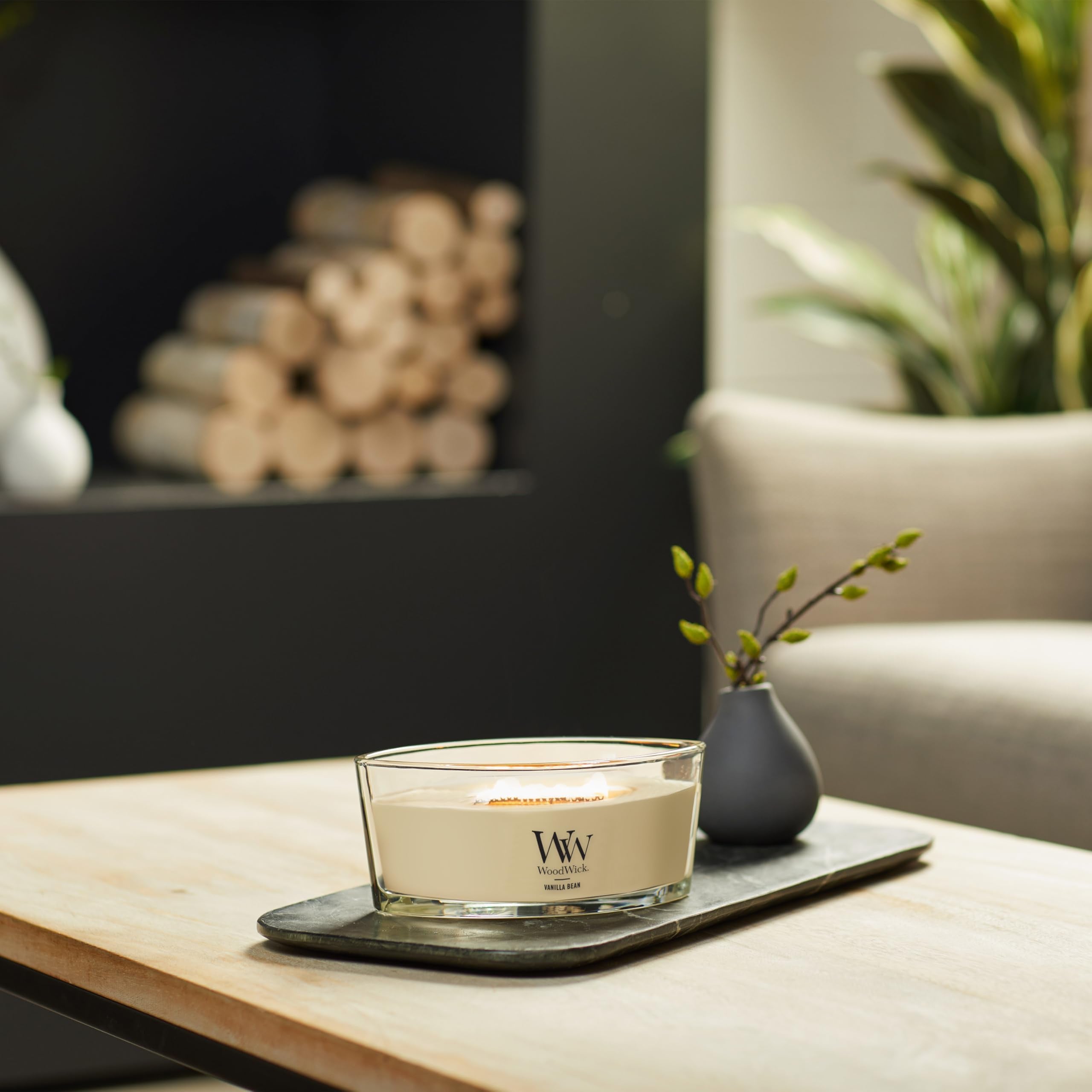 WoodWick Vanilla Bean Candle crackling-wick closeup evokes fireplace ambience and cozy mood.