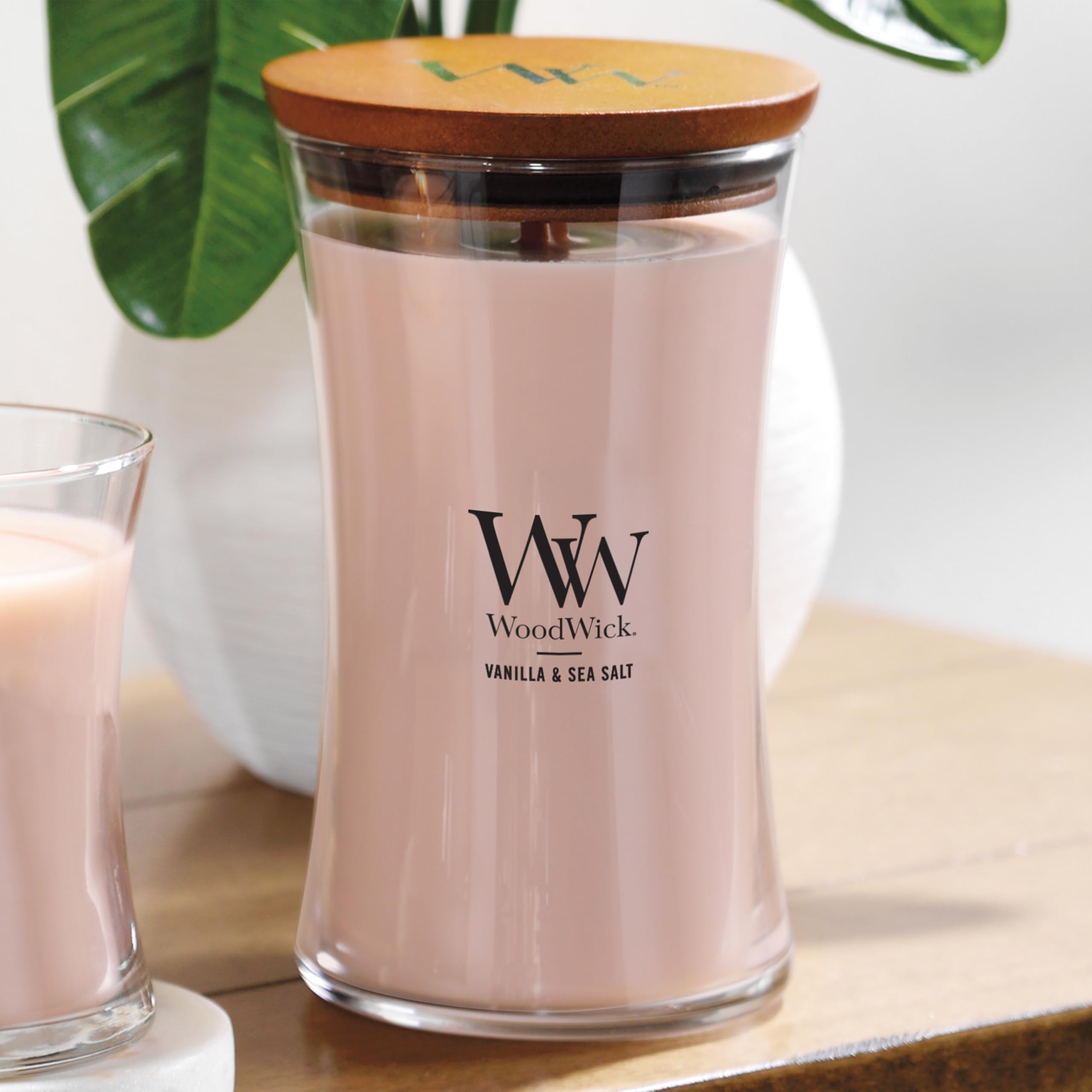 WoodWick Vanilla Sea Salt hourglass design shown from the side enhances modern decor.