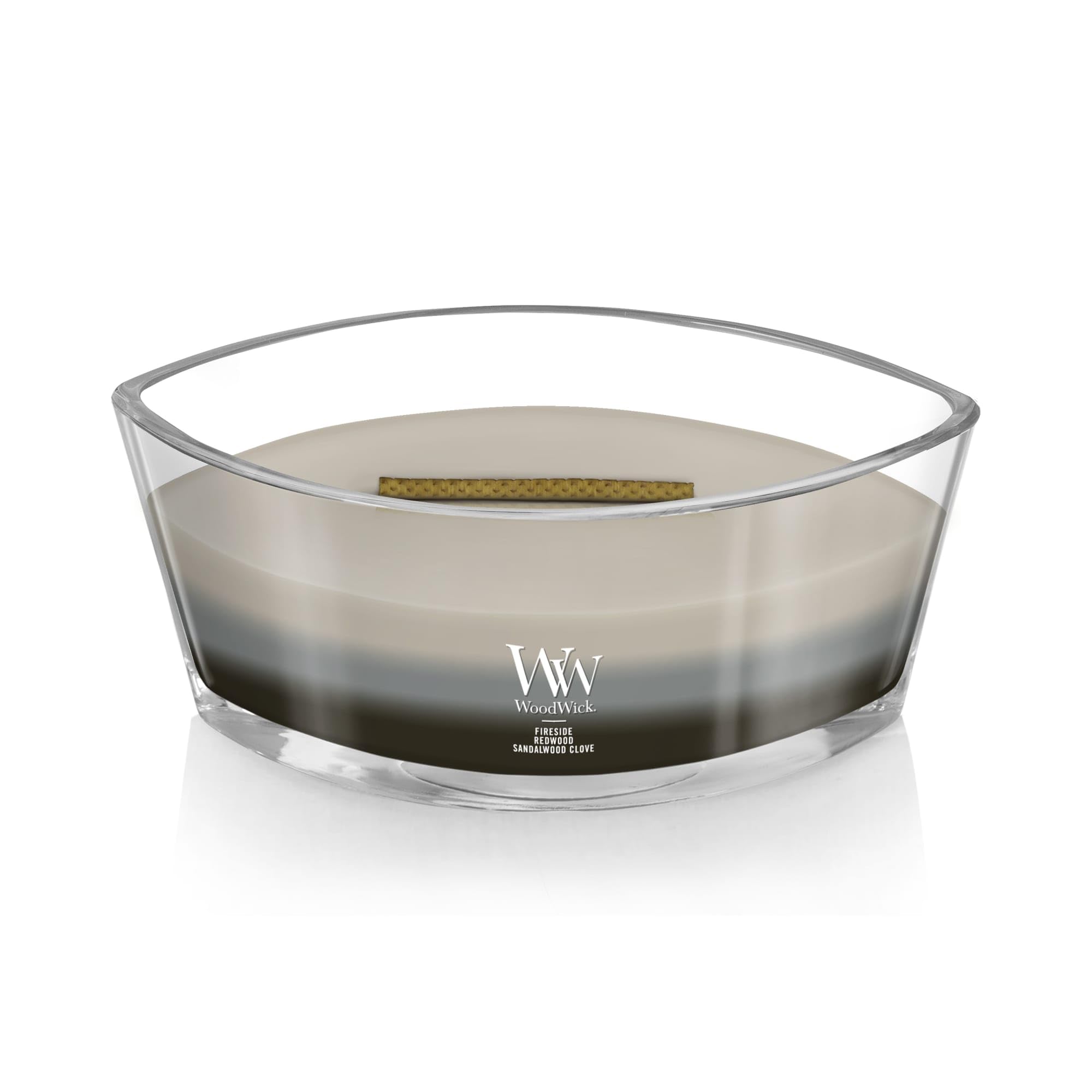WoodWick Warm Woods Trilogy sandalwood clove ellipse delivers aromatic warmth and comforting ambiance