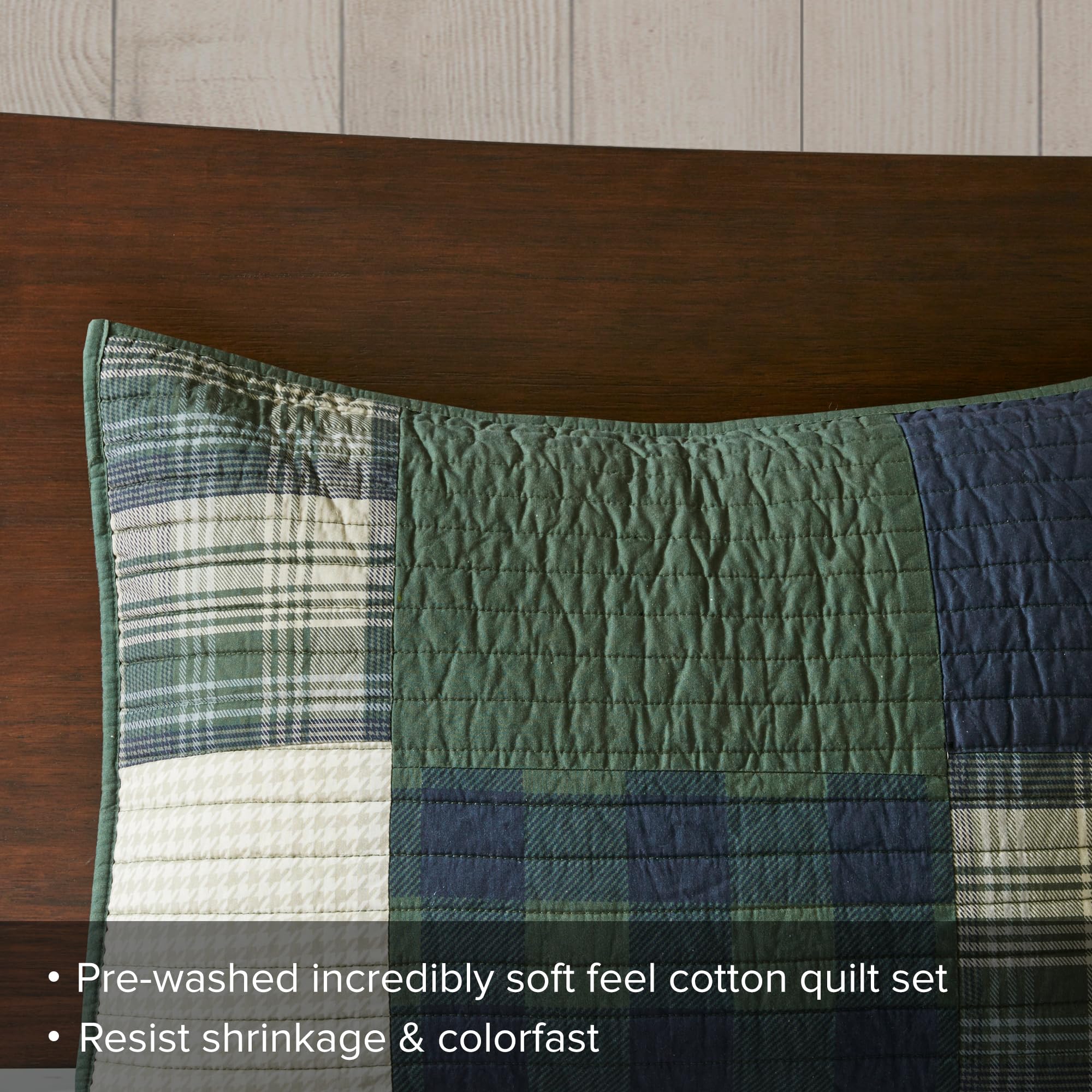Woolrich Mill Creek bed setup in a cozy cabin ambiance