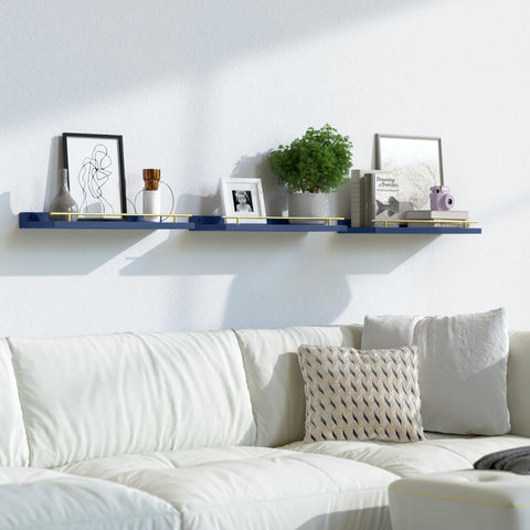 Bathroom and kitchen decor organized on navy blue shelves