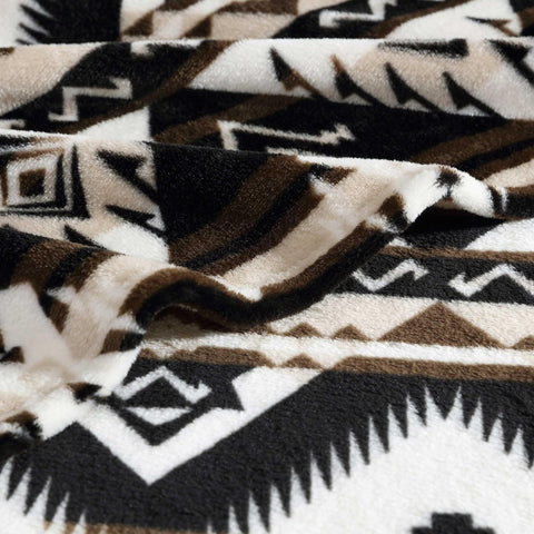 Wrangler Sherpa throw blanket with heritage logo patch adds classic Americana flair
