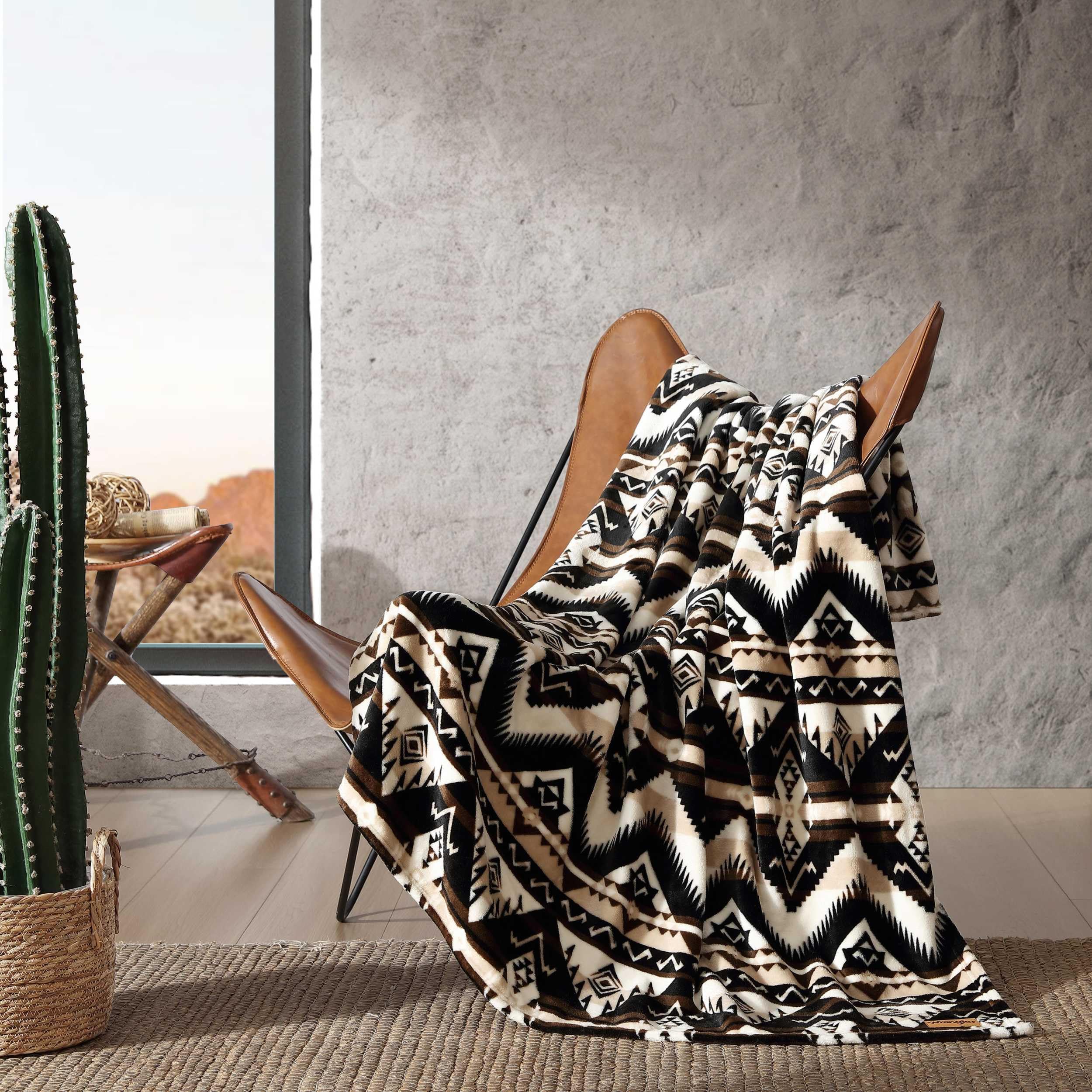 Wrangler Sherpa throw blanket close-up of ultra-soft fleece texture for comfort
