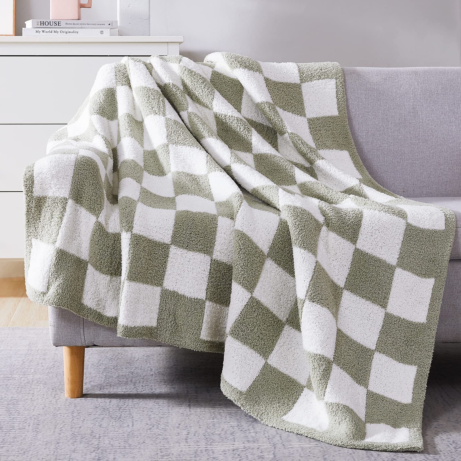 WRENSONGE checkered throw on sofa adds warmth and style