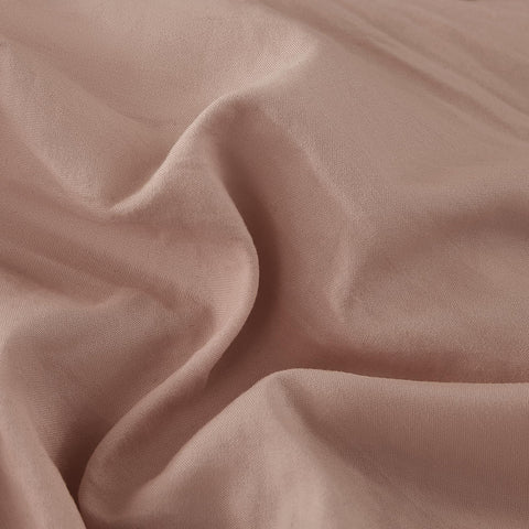 WRENSONGE Minimalist bedroom decor scene with dusty-pink set