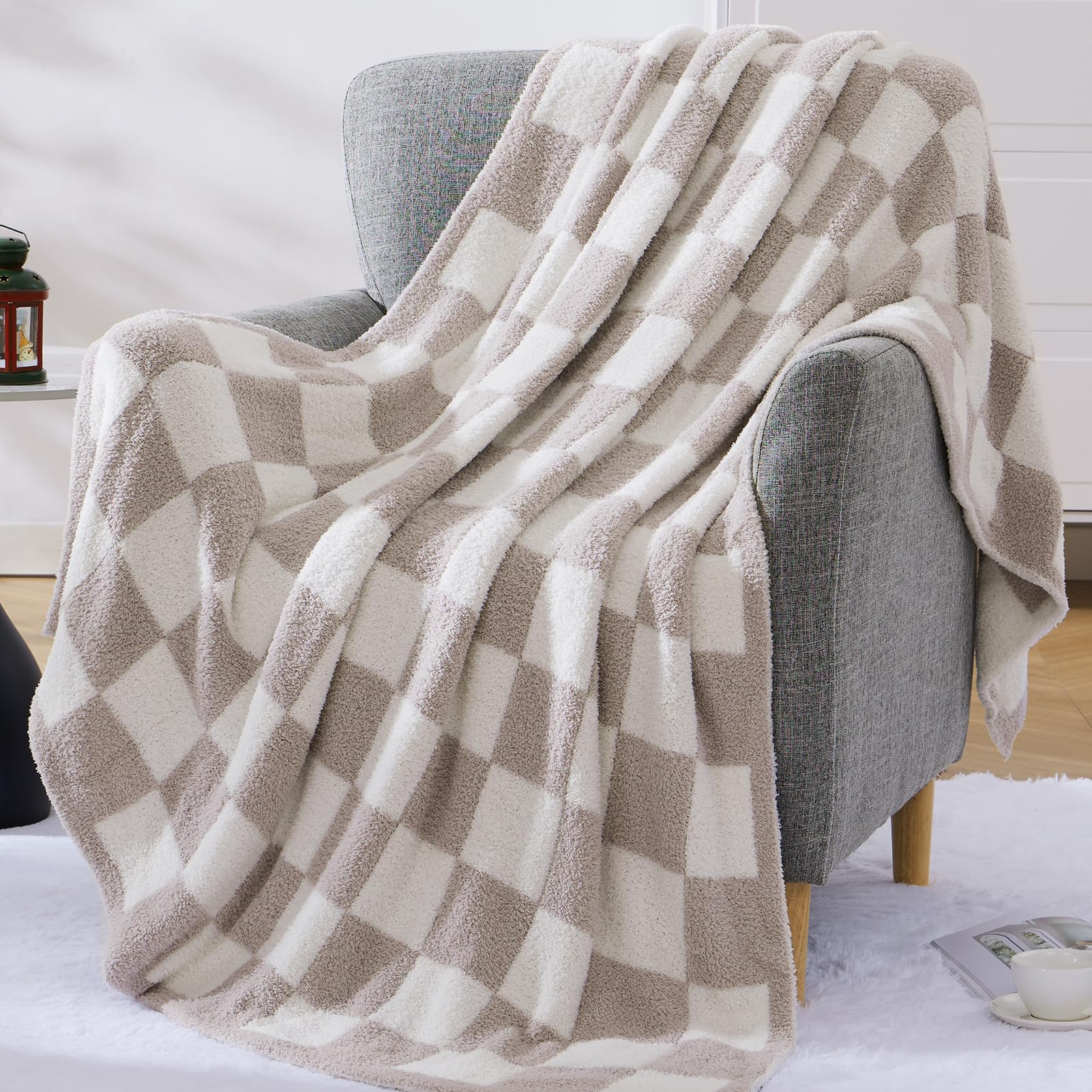 WRENSONGE checkered throw blanket in travel bag showing compact design