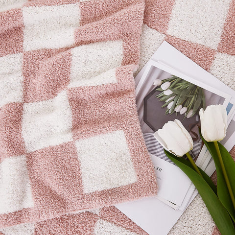 WRENSONGE checkered throw travel compact demonstrates lightweight comfort on the go.
