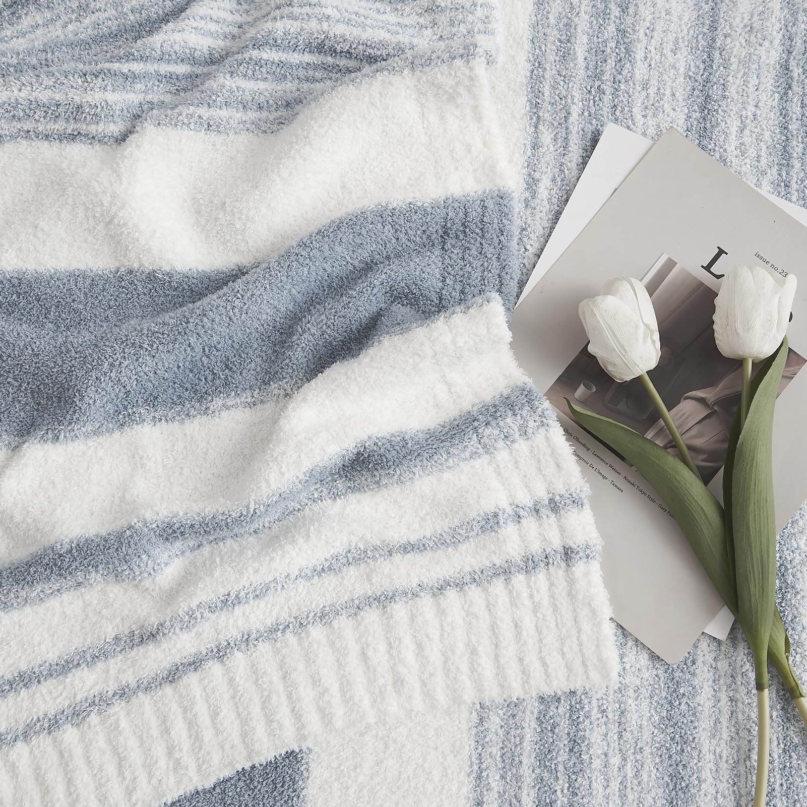 WRENSONGE grey blue throw blanket folded on bed showing stripes