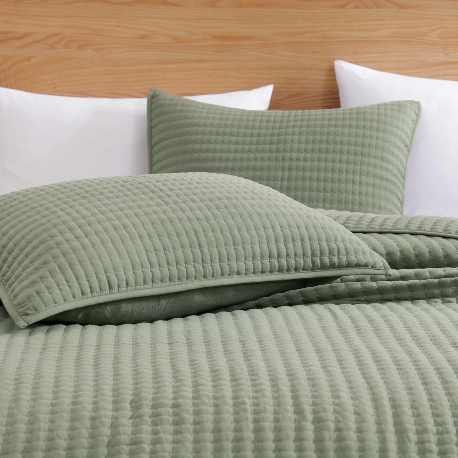 WRENSONGE quilt as a protective, decorative sofa cover