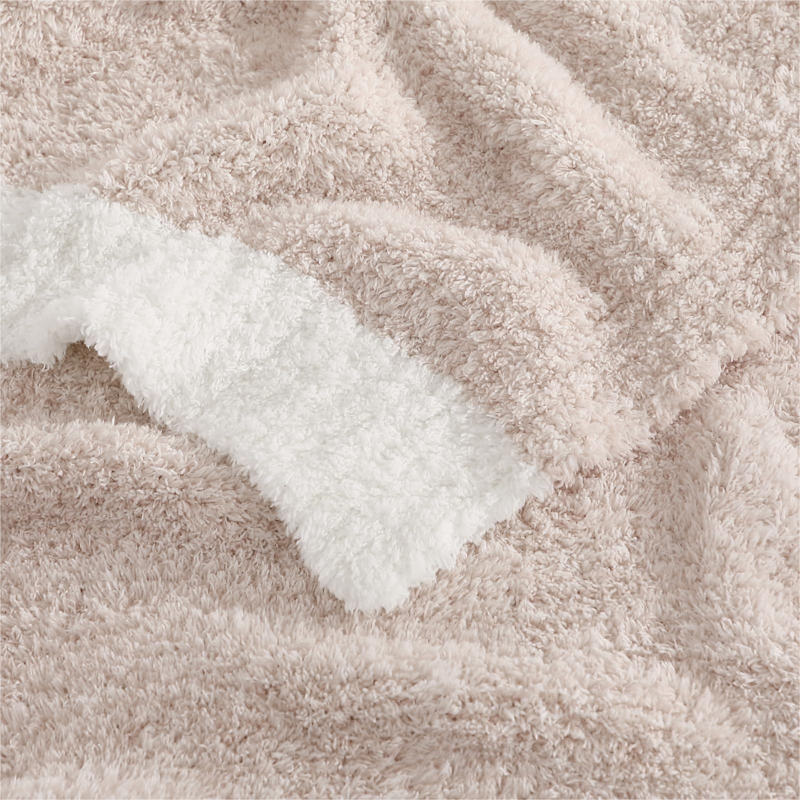 WRENSONGE blanket adds elegance to sofa, bed, or chair
