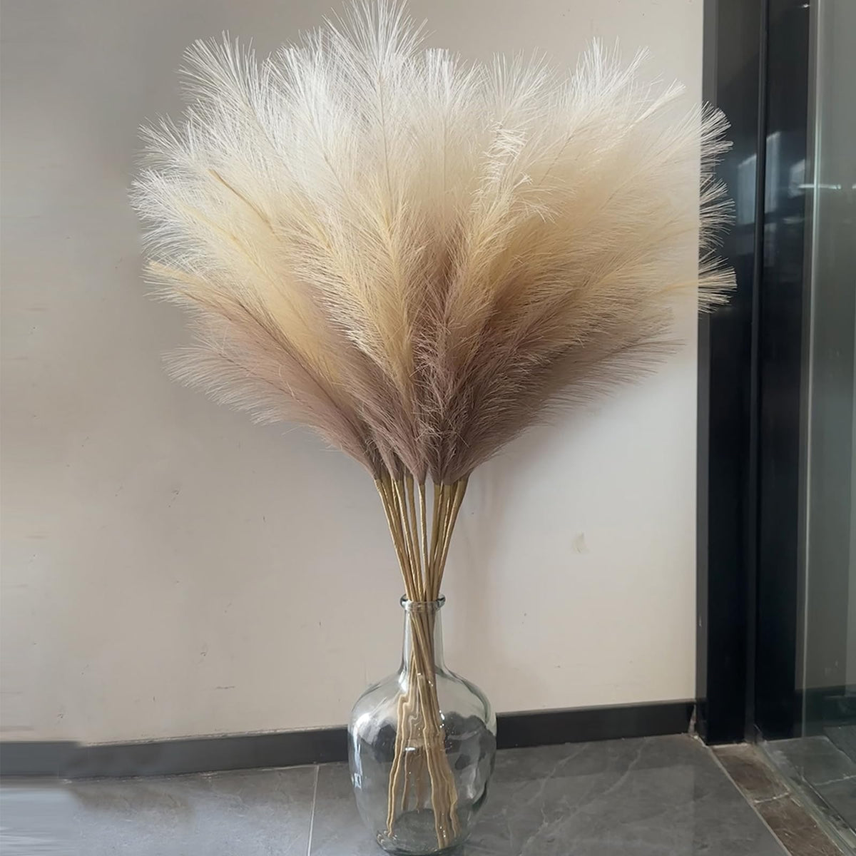 Wttisel 38-inch faux pampas grass in a tall vase adds airy texture.
