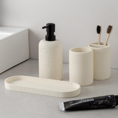 WUUAHOME travertine bathroom scene showing coordinated counter display.