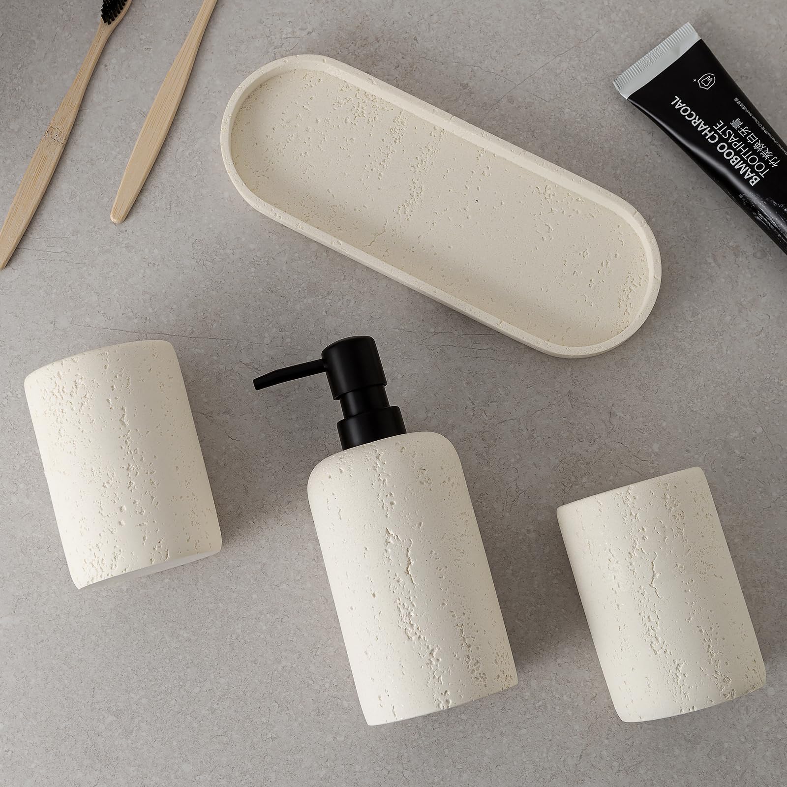 WUUAHOME travertine toothbrush holder keeps brushes upright and hygienic.