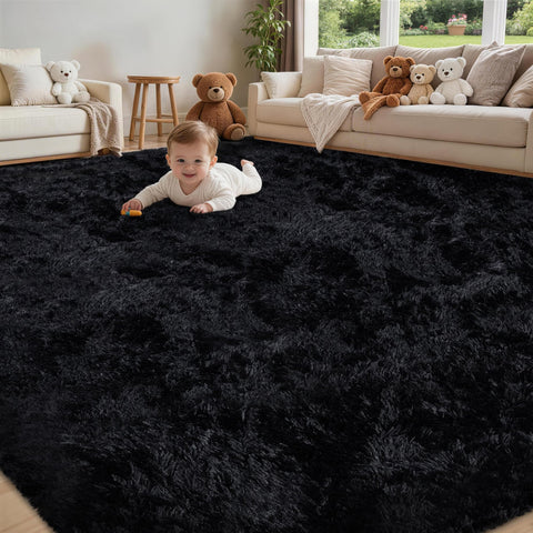 Xafir ultra-soft black 5x7 living room rug adds plush comfort to floors.