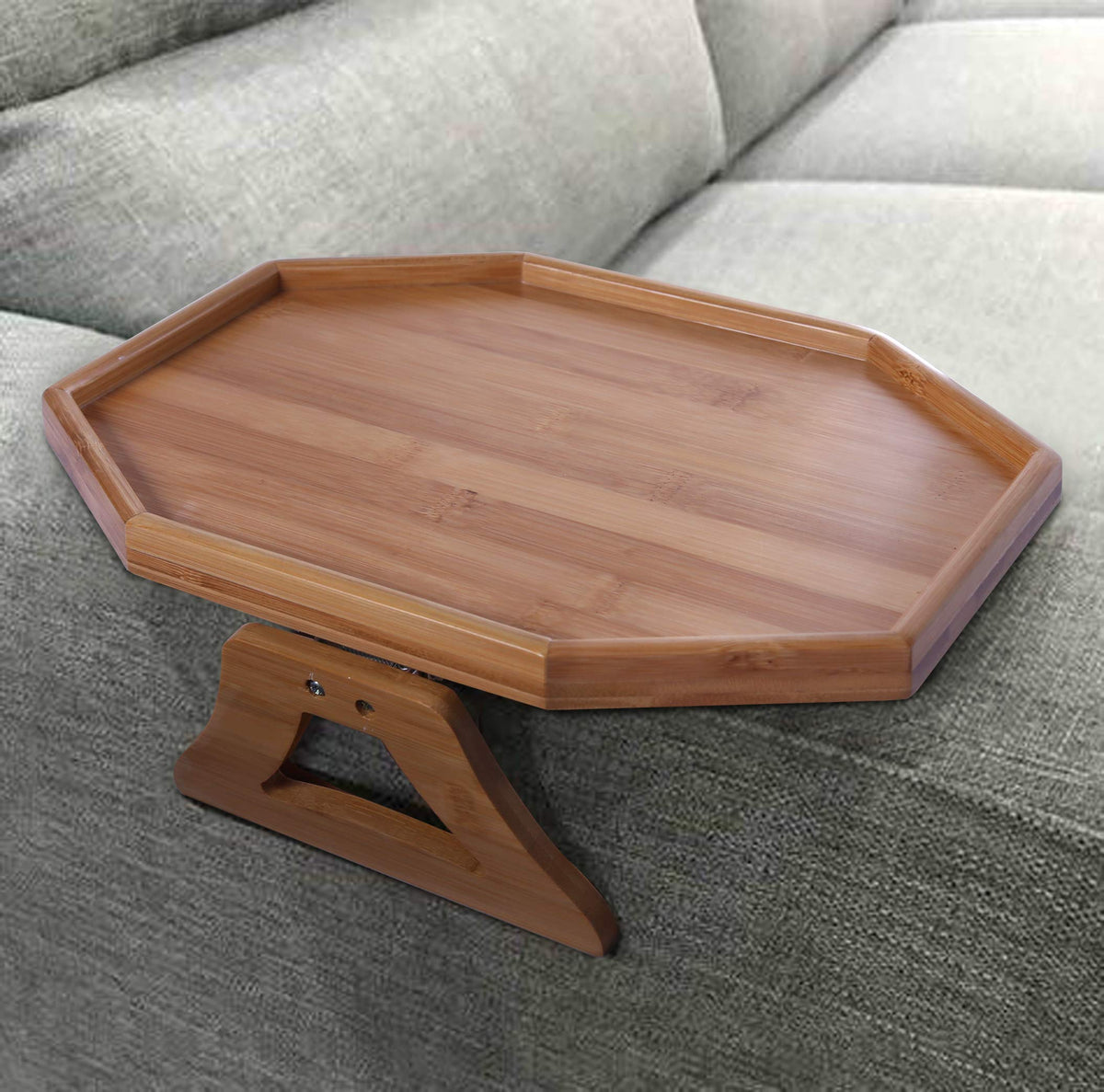 Xchouxer bamboo clip-on side table attached to armrest for easy reach of remotes