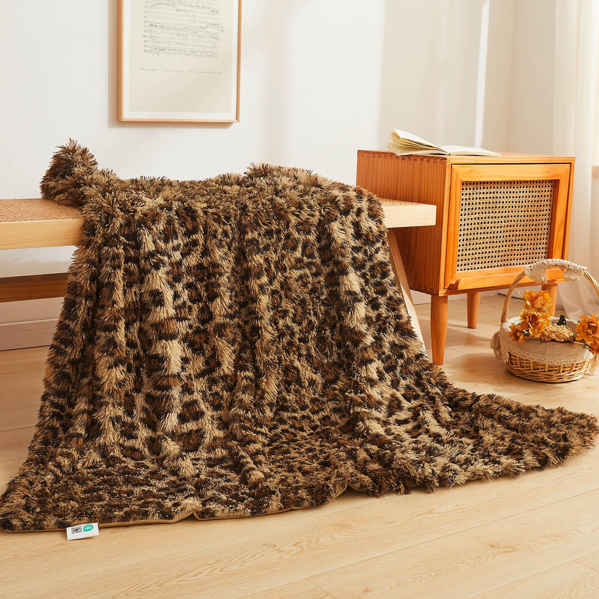 XeGe luxury leopard throw on sofa, warm and plush